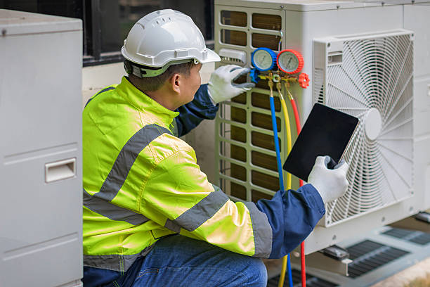 Professional Heat Pump Repair technician working in Saint Marys, GA